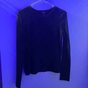 a long sleeve black shirt.